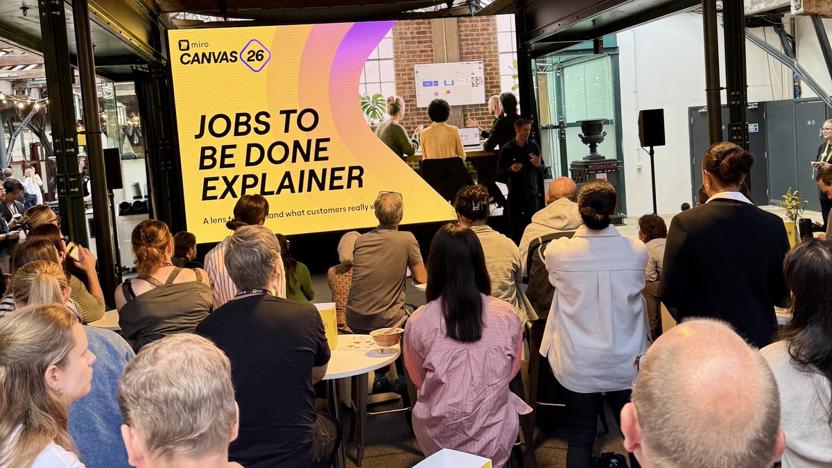 A full room at Miro Canvas 26 watching the Jobs to Be Done Explainer session